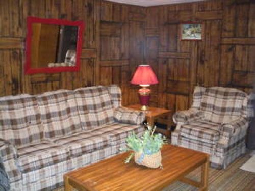 living room has two sofas and two chairs