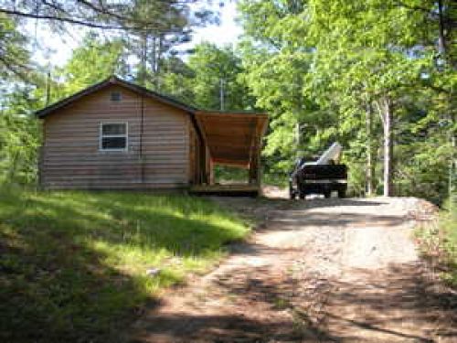 view of cabin from driveway